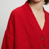 Model in Cherry Red V-Neck Knit Cardigan