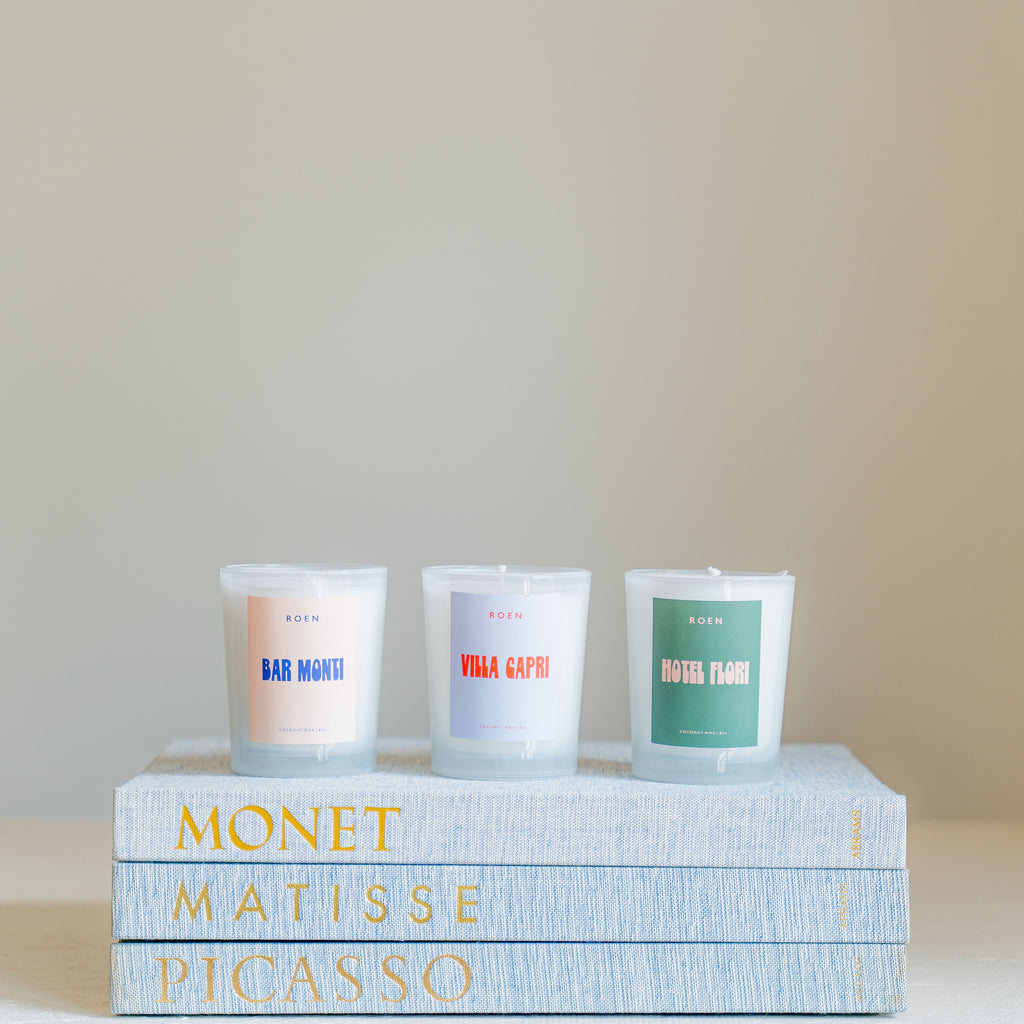 Roen Bar Monti Candle Modeled With Other Roen Candles