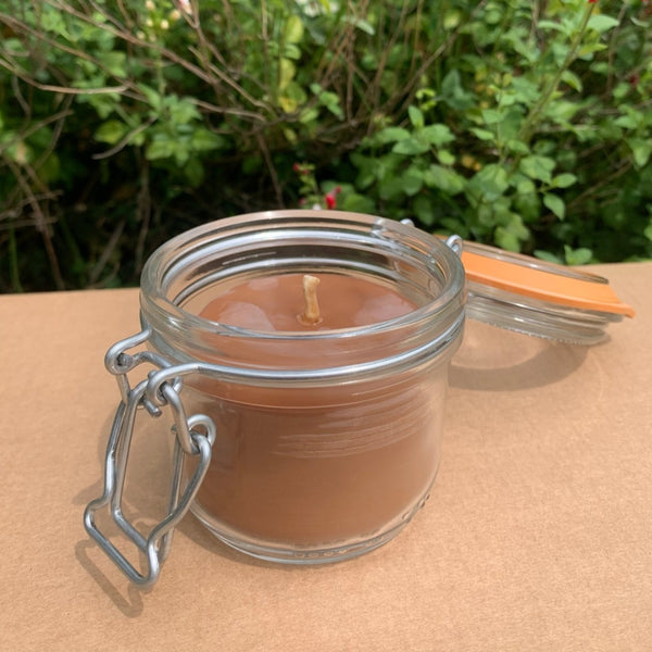 Artisanal Candle in a Glass Jar Made of Beeswax