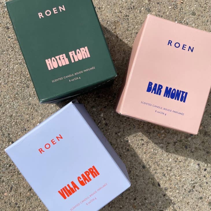 Packaged Roen Bar Monti Candle Modeled With Roen Candles