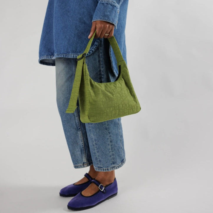 Model Holding Avocado Baggu Mini Nylon Shoulder Bag