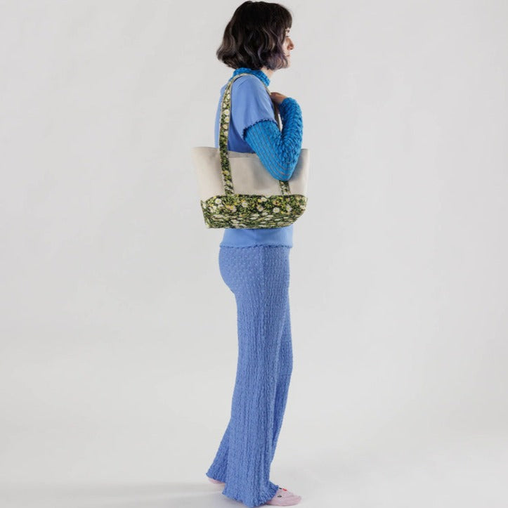 Model Carrying the Small Baggu Boat Tote 