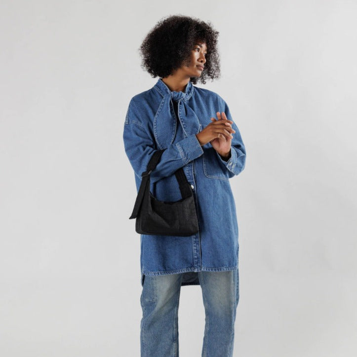 Model Holding Black Baggu Mini Nylon Shoulder Bag