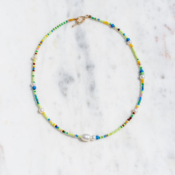 Pearls and Green Beads Necklace by Protextor Parrish