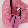 Model Holding Extra Pink Baggu Sport Crossbody Bag