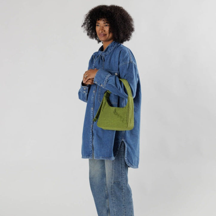 Model Holding Small Avocado Baggu Nylon Shoulder Bag