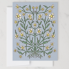 Greeting card with floral design on a light blue background