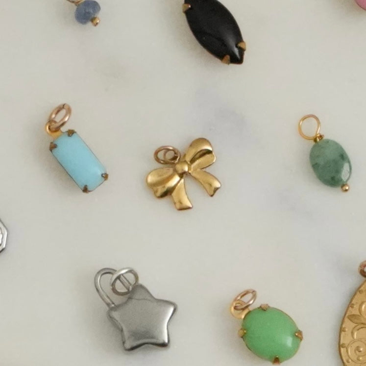 Cute, sweet, delicate, dainty, demure, elegant — these darling little charms bring classically feminine images to mind. Charms can be applied to necklaces or bracelets. 