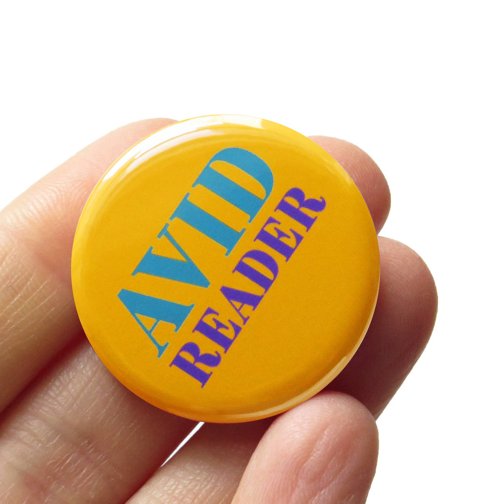 Avid Reader Social Alert Pinback Button at Golden Rule Gallery in Excelsior