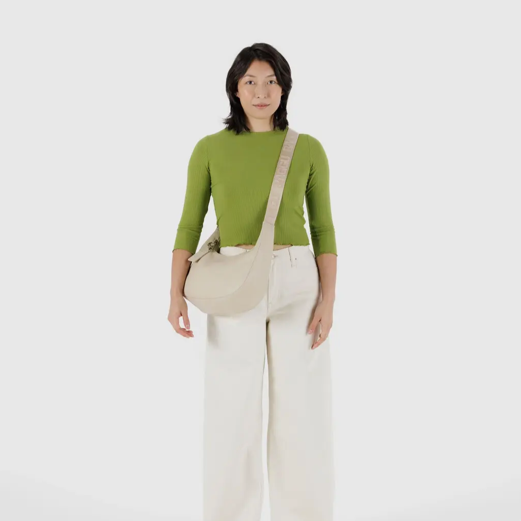 Baggu Leather Crescent Crossbody Bag in the Color Stone at Golden Rule Gallery