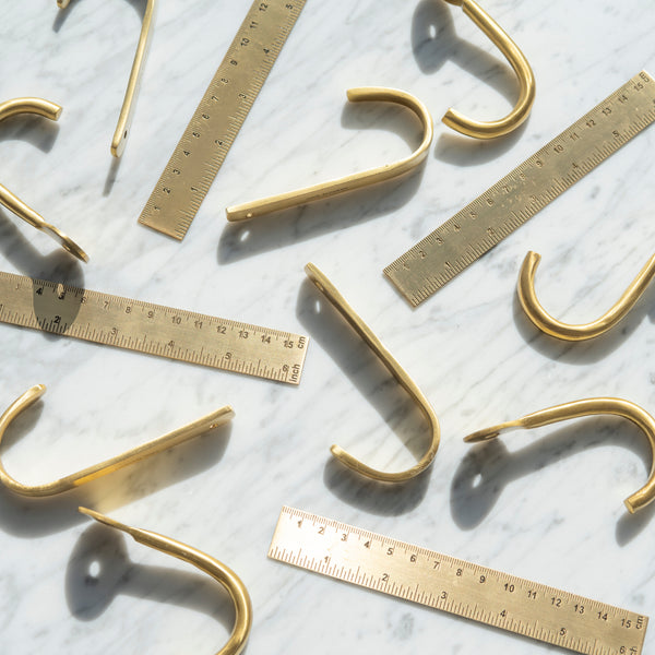 Brass Wall Hooks and 6 Inch Rulers at Golden Rule Gallery