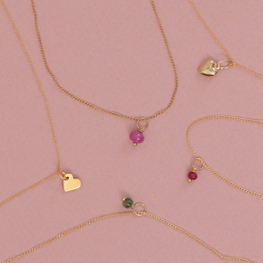 Close Up of Singapore Chain Necklaces in Gold