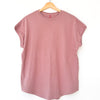 Mauve sleeveless top by Le Bon Shoppe on a wooden hanger against a white background