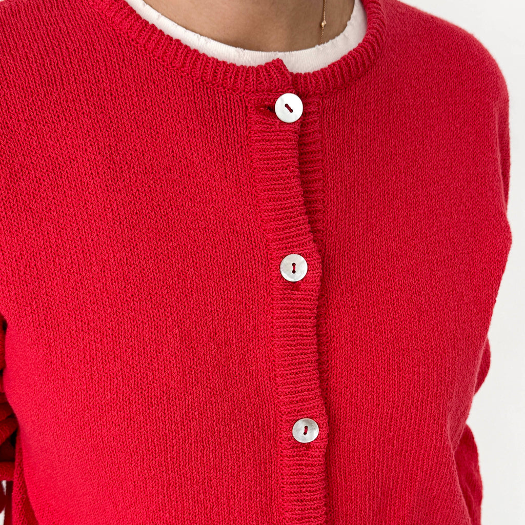 Close Up of 100% Cotton Sweater with Shell Buttons