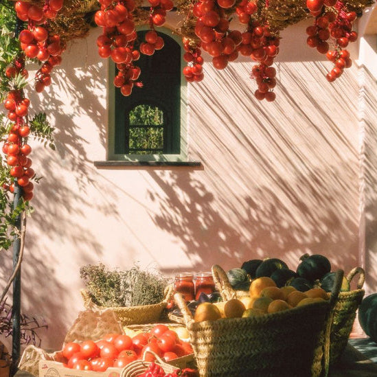 Flamingo Estate with baskets of tomatoes 