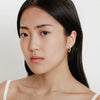 Model in Camille Gold Earrings
