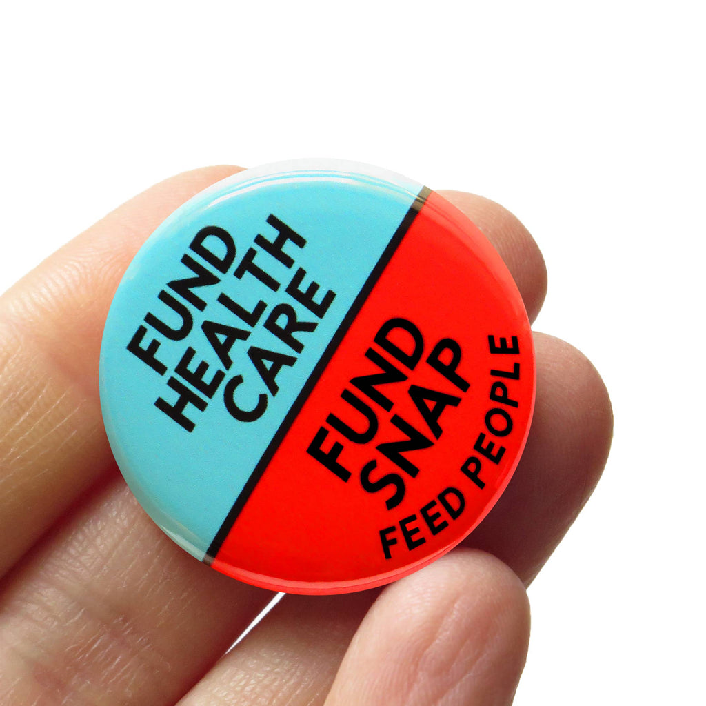 Fund Health Care and Snap Benefits Pin at Golden Rule Gallery
