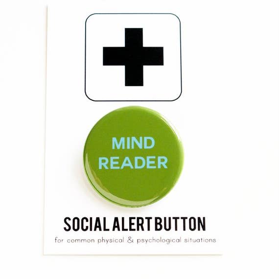 Green button labeled 'Mind Reader' with a black cross symbol above it on a white background.