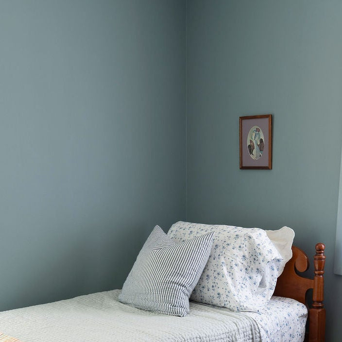 Golden Rule Picasso Portrait on Farrow & Ball Oval Room Blue for Parrish House Rentals