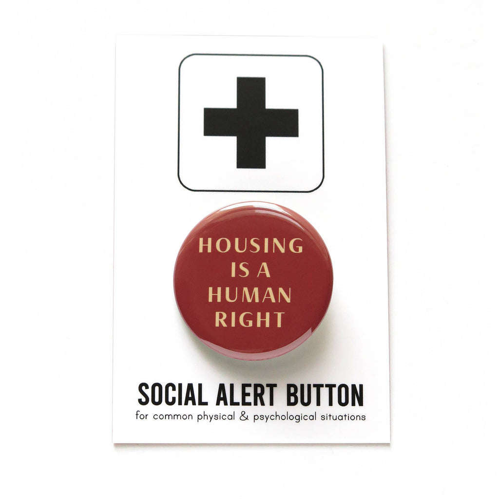 Housing is a Human Right Social Alert Buttons at Golden Rule Gallery in Minneapolis