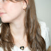 Model in J'adore Beddor Vintage Jewelry Clip Ons and Necklace