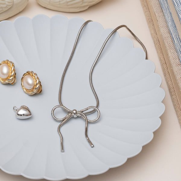 Close Up of Vintage Silver Bow Necklace