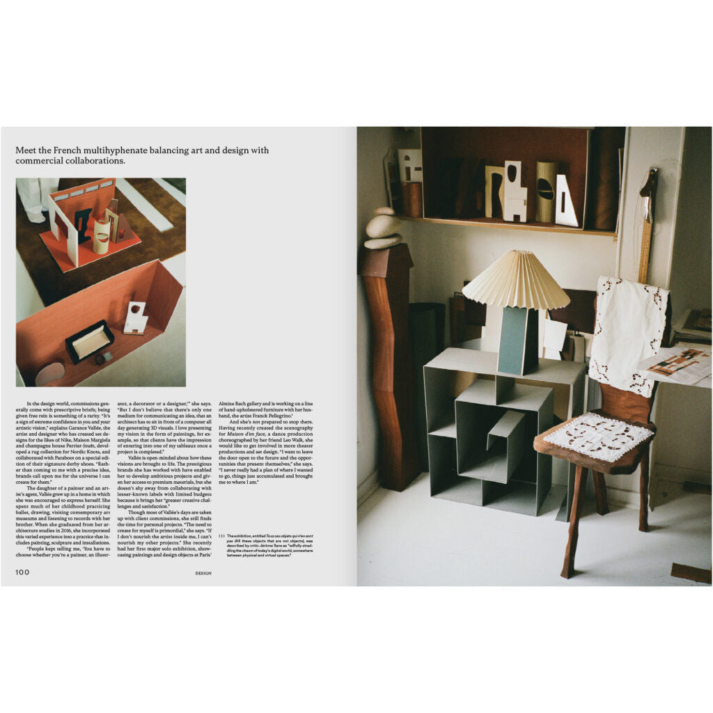 Interior design magazine spread with a room setup featuring furniture and decor.