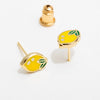 Lemon-shaped earrings with gold accents on a white background