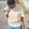 Layered White Tee with Sweater Vest at Golden Rule Gallery