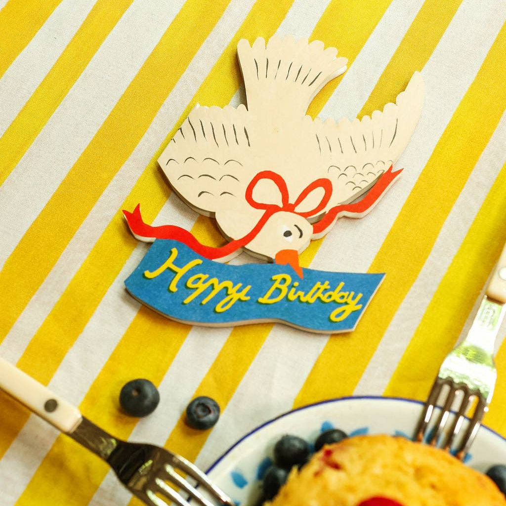 Happy Birthday card with a dove design on a yellow and white striped background