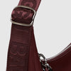 Mahogany Red Recycled Leather Crescent Bag with Key Loop by Baggu at Golden Rule Gallery in Excelsior