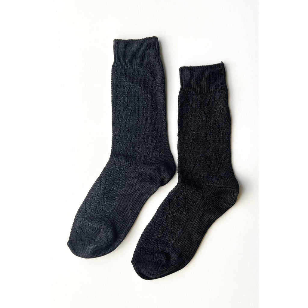 Modal Eyelet Socks in Black on White Background