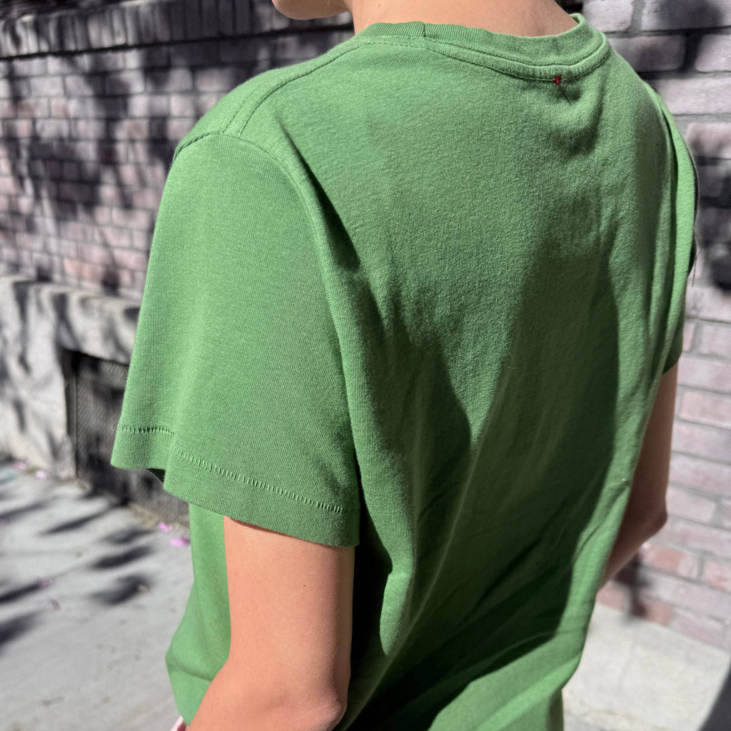 Person wearing Artichoke Noel Tee Shirt by Le Bon Shoppe 