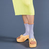 Model Wearing the Corbusier Crew Socks in Cornflower Blue at Golden Rule Gallery