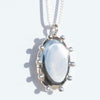 Close Up of Silver Modern Oval Locket Necklace