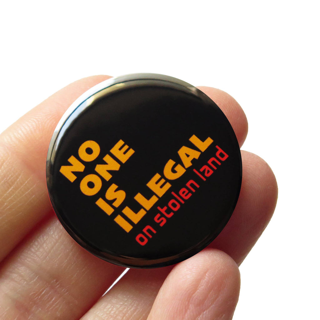 No One is Illegal on Stolen Land Pin Button at Golden Rule Gallery in Excelsior
