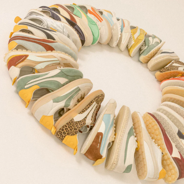 Colorful patterned shoes arranged in a circular formation on a light background