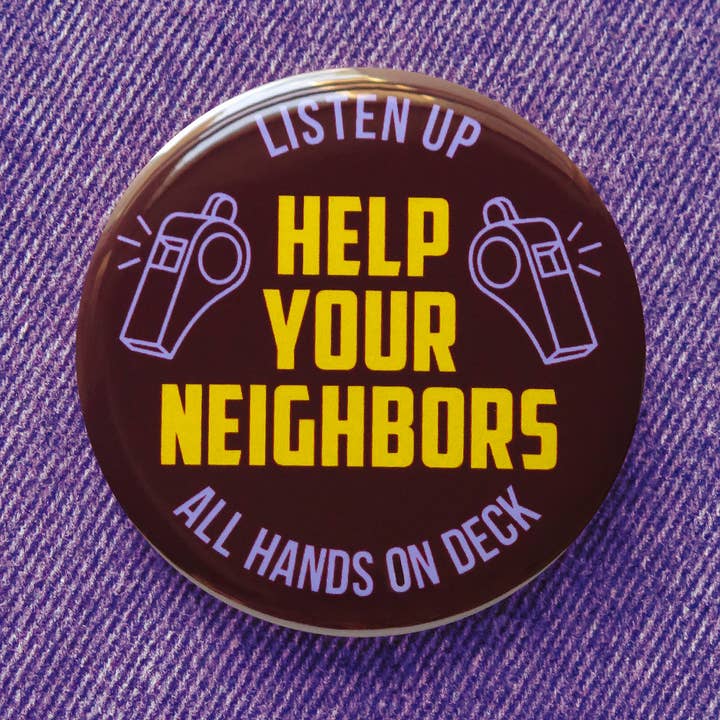 Button badge with text 'Listen Up, Help Your Neighbors, All Hands On Deck' on a purple denim background