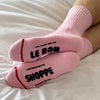 Pink Socks with Grip at the Bottom at Golden Rule Gallery