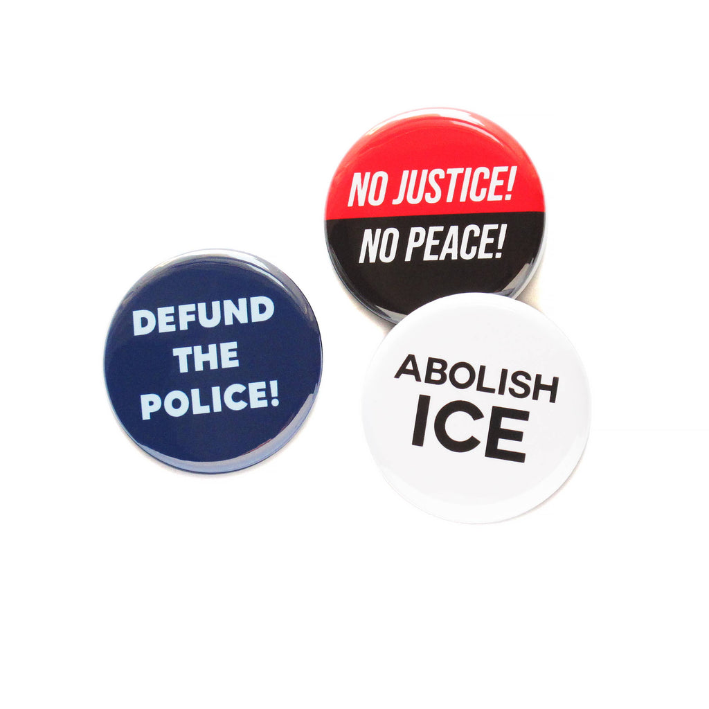 Political Protest Pinback Buttons at Golden Rule Gallery