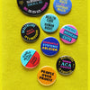 Political Protest Social Alert Buttons at Golden Rule Gallery in Minneapolis