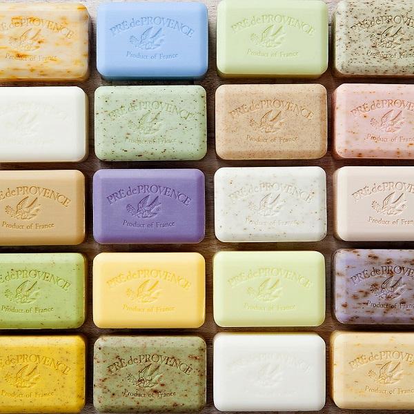 Assorted bars of soap from Pre de Provence arranged in a grid.