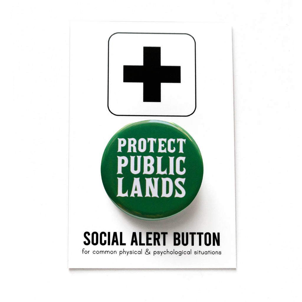 Protect Public Lands Social Alert Pinback Button by Word for Word at Golden Rule Gallery in Minneapolis