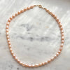 Real Freshwater Pearl Necklace with Gold Detailing at Golden Rule Gallery