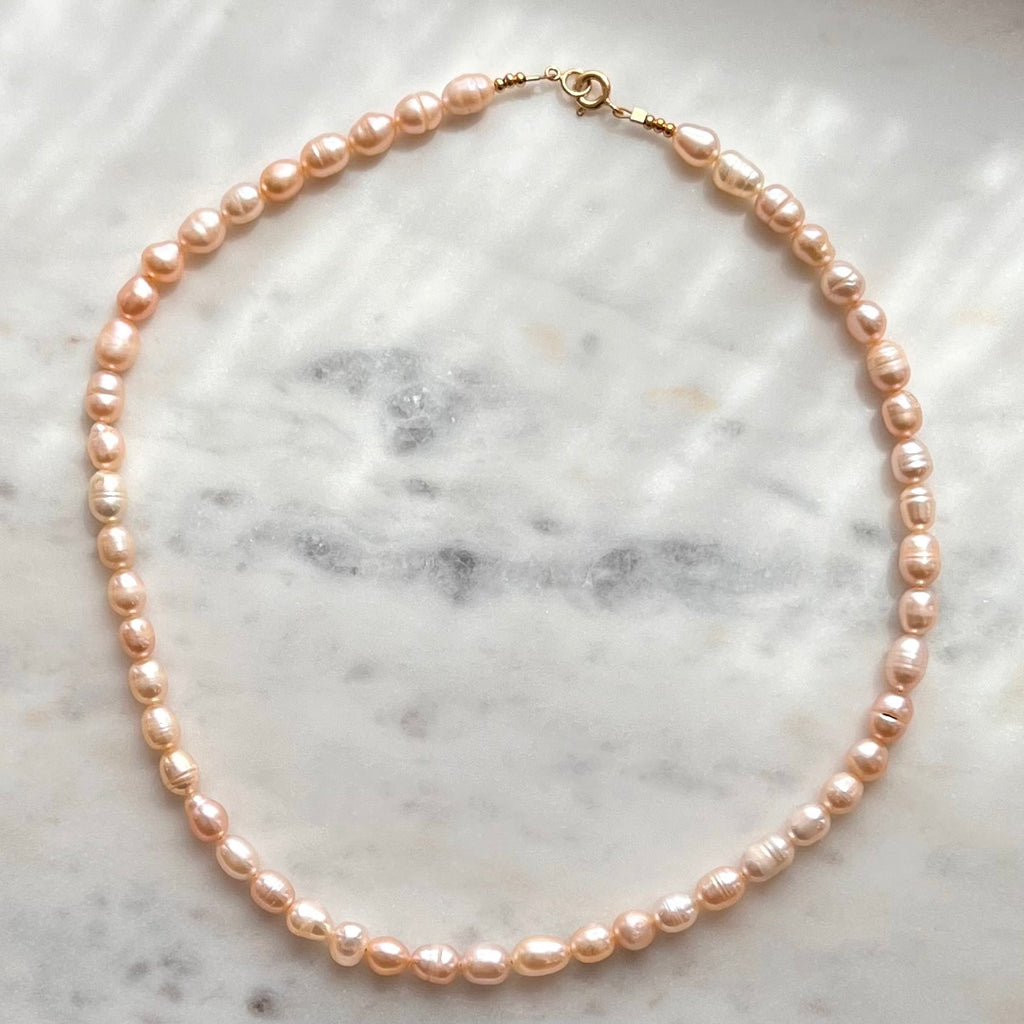 Real Freshwater Pearl Necklace with Gold Detailing at Golden Rule Gallery