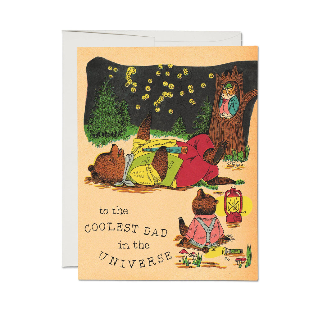 Greeting card with cartoon bears in a forest setting and text 'to the COOLEST DAD in the UNIVERSE'.
