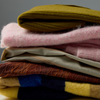 Stack of Rita Row Knitwear