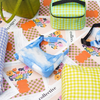 Clouds Print Baggu Mini Nylon Shoulder Bag Styled with Colorful Baggu Bags on Modern Graphic Design Prints