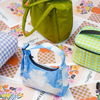 Colorful Baggu Bags Styled in Magazine Prints