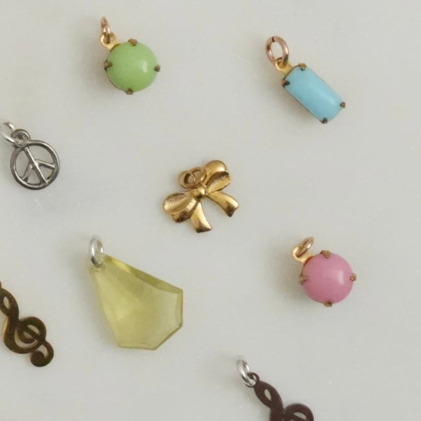 Cute, sweet, delicate, dainty, demure, elegant — these darling little charms bring classically feminine images to mind. Charms can be applied to necklaces or bracelets. 